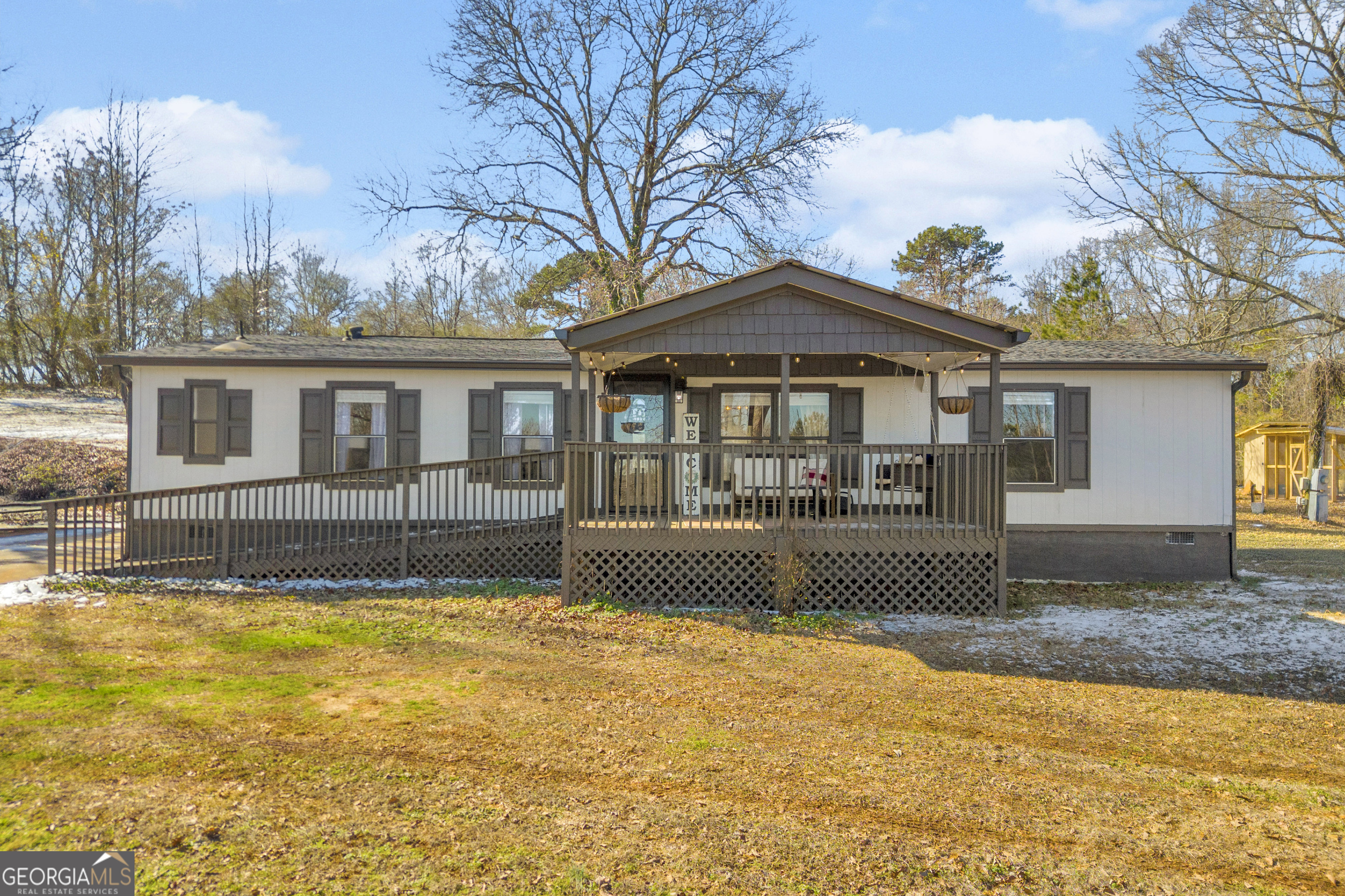 3656 Candler Road Pendergrass, GA 30567 - Photo 2 of 34 a front view of a house with swimming pool