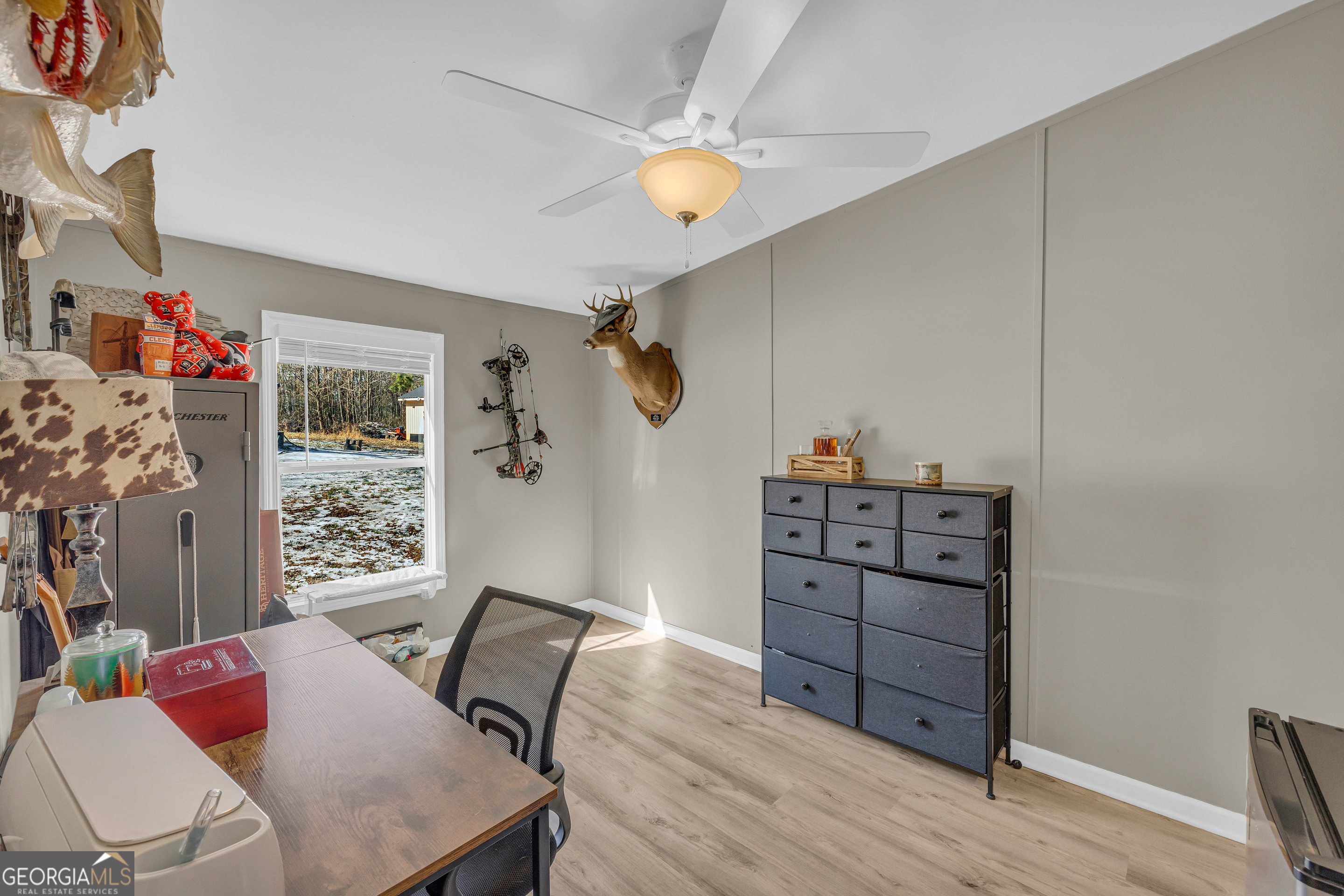 3656 Candler Road Pendergrass, GA 30567 - Photo 33 of 34 a living room with furniture and decor