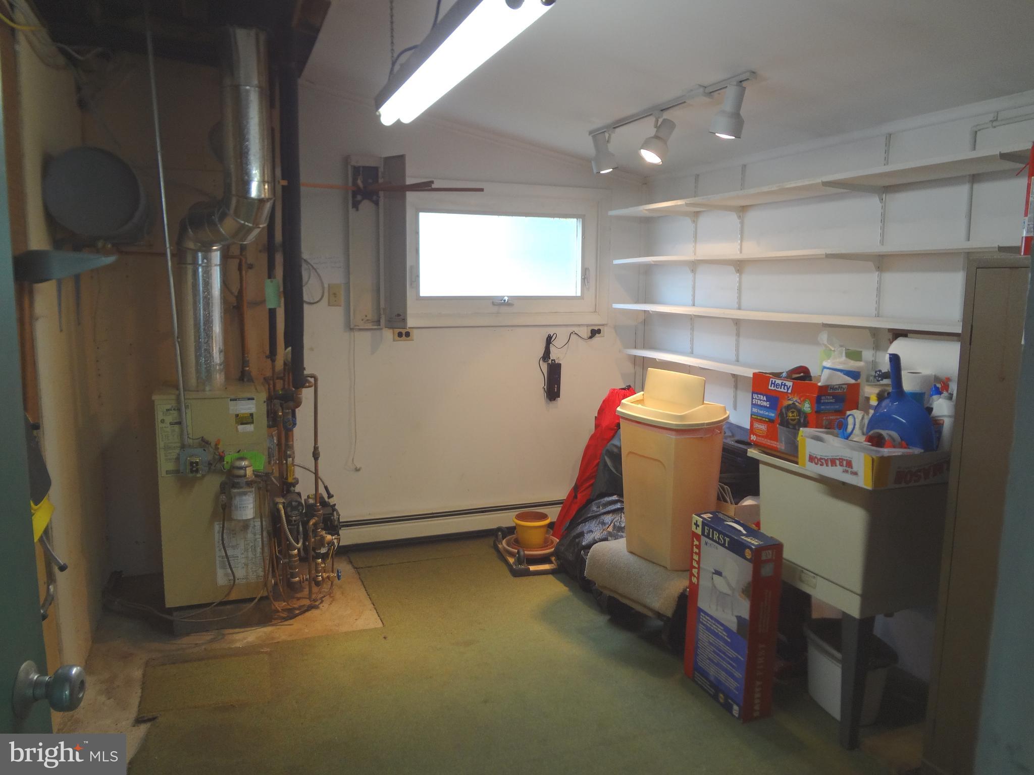 91 Cardinal Road Levittown, PA 19057 - Photo 18 of 26 a view of a room with gym equipment