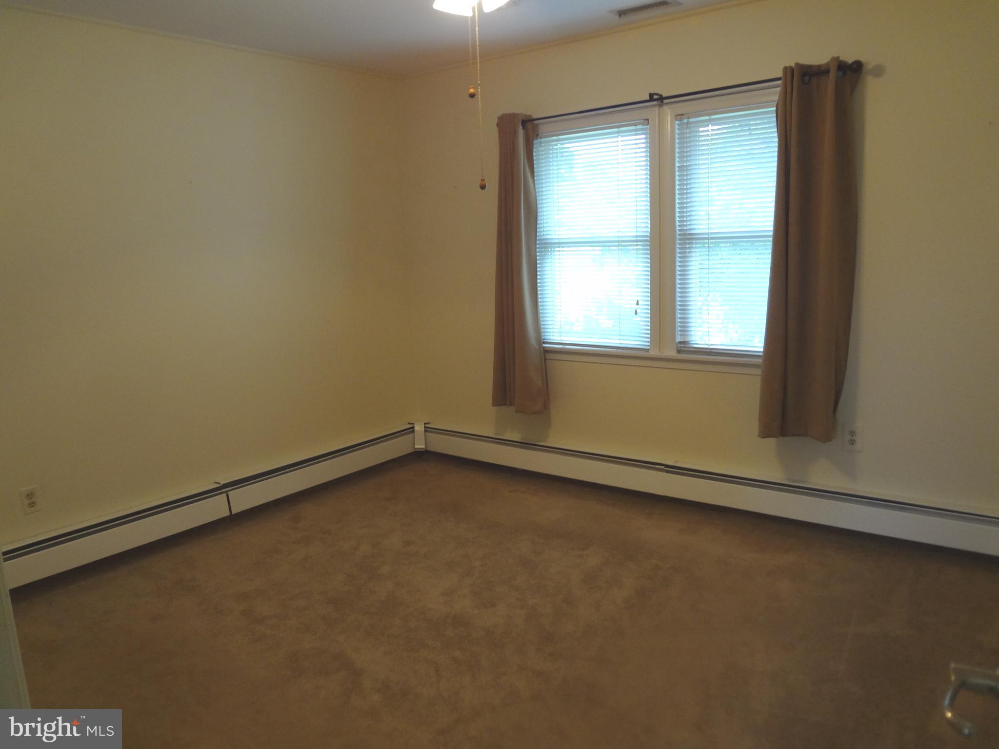 91 Cardinal Road Levittown, PA 19057 - Photo 9 of 26 an empty room with a window