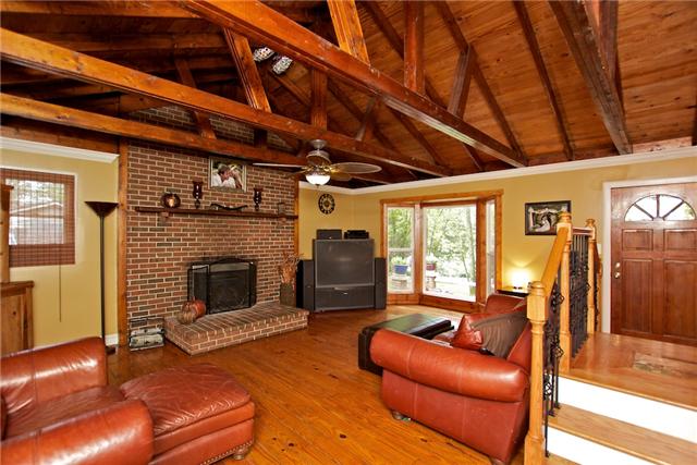 Walk-in to the beautiful exposed beams, hardwood floors & enjoy the cozy living space!