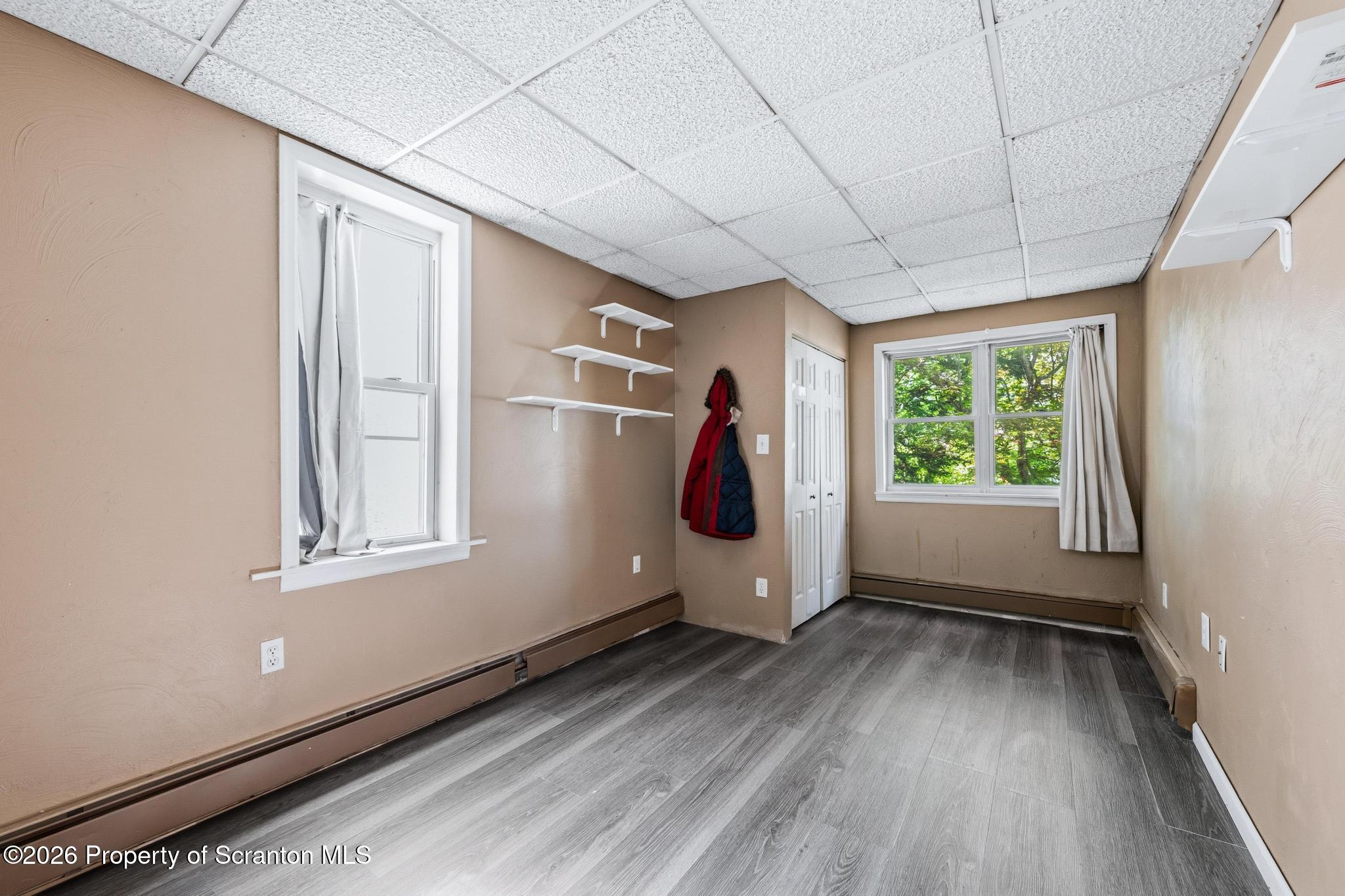 518 Prospect Avenue Scranton, PA 18505 - Photo 24 of 59 a view of empty room with wooden floor and fan