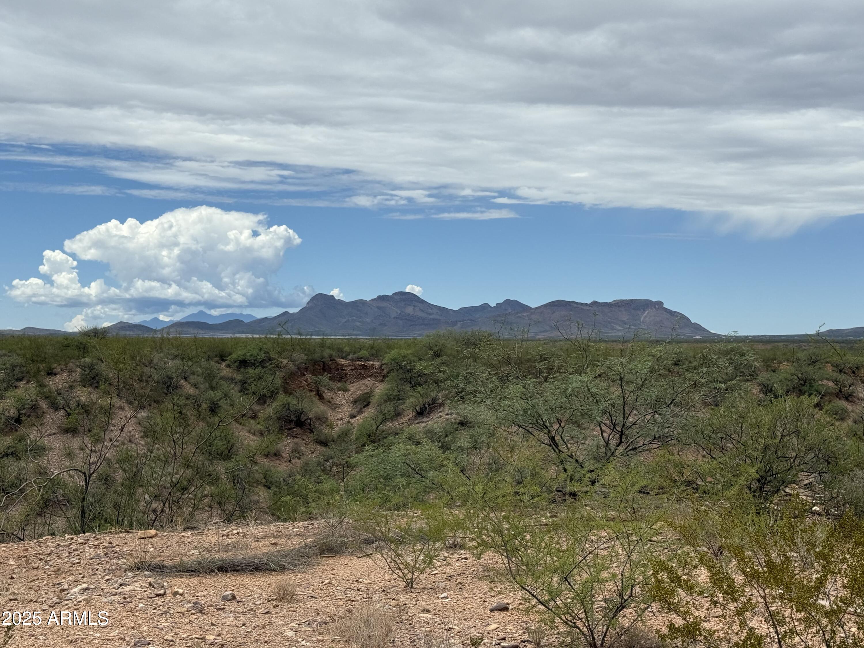 1030 North Hunt Ranch Trail Huachuca City, AZ 85616 - Photo 28 of 28 a view of mountain with sunset in background