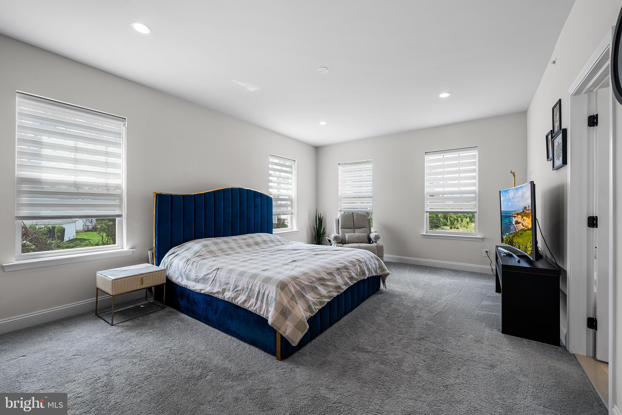 111 Park View Lane Royersford, PA 19468 - Photo 22 of 49 a spacious bedroom with a bed and dresser with wooden floor
