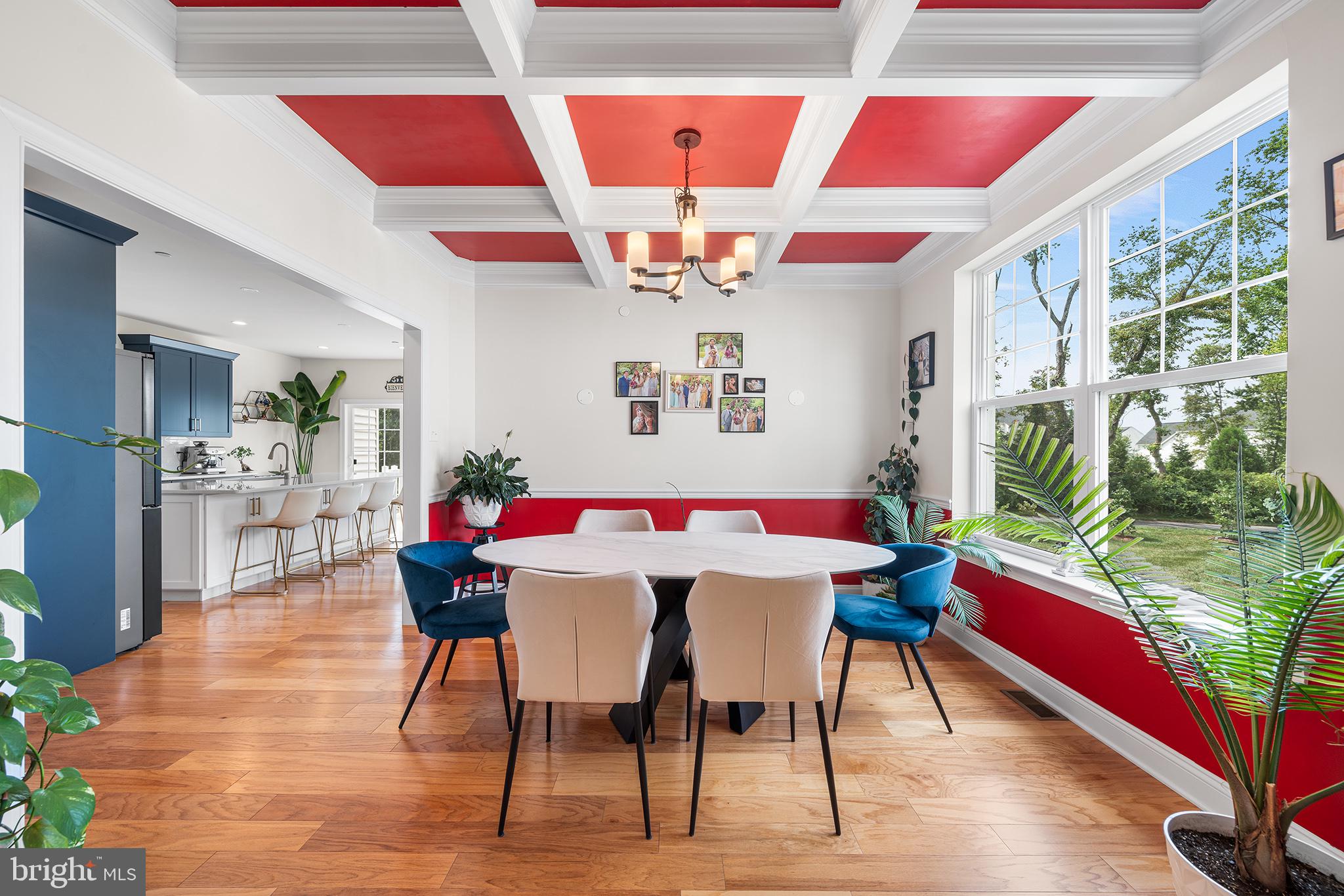 111 Park View Lane Royersford, PA 19468 - Photo 5 of 49 a view of a dining hall with a dining table and chairs with wooden floor