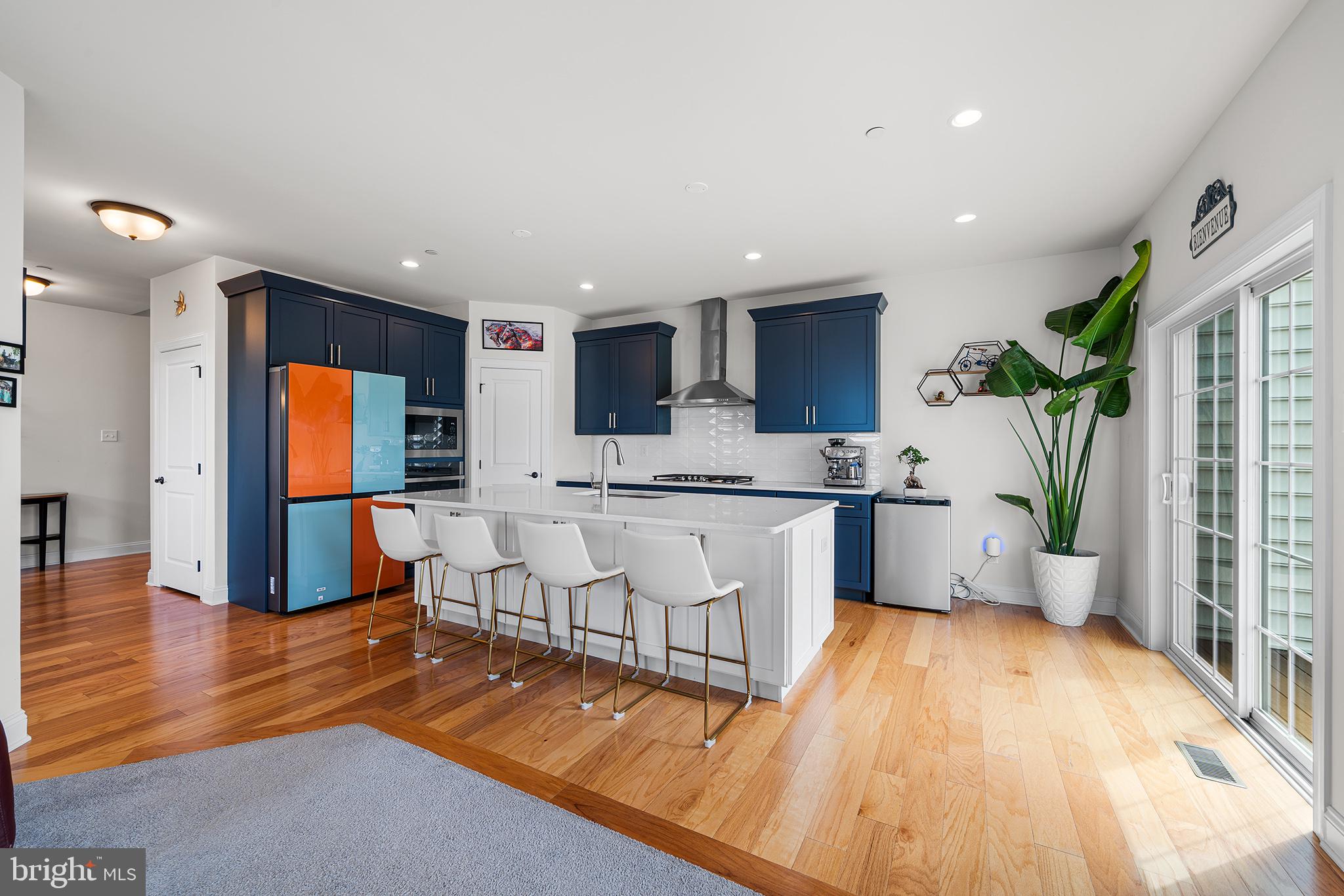 111 Park View Lane Royersford, PA 19468 - Photo 9 of 49 a living room with stainless steel appliances furniture wooden floor and a kitchen view