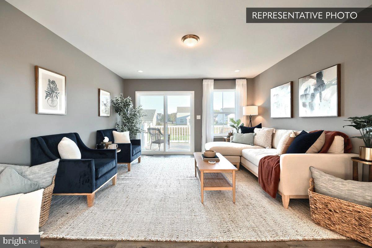 136 Redbud Road Bellefonte, PA 16823 - Photo 10 of 22 a living room with furniture lamp and a large window