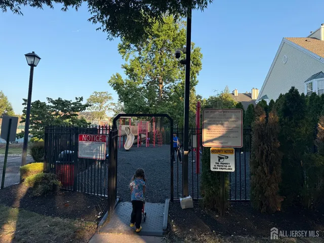 a view of a street with sitting area