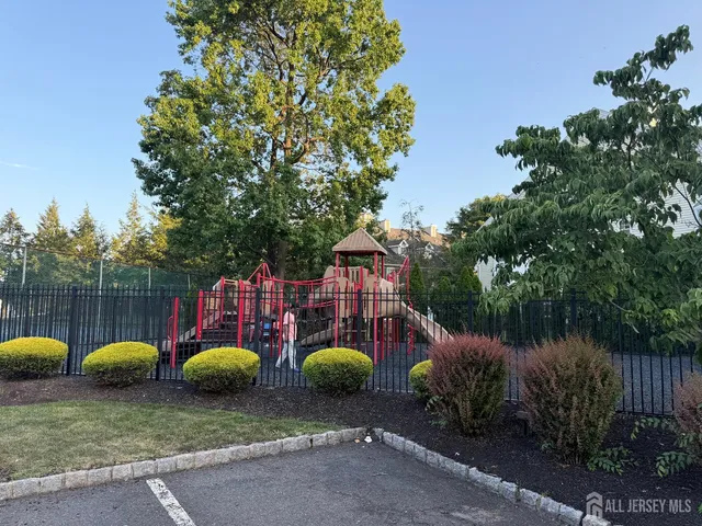 a view of an outdoor space with swimming pool