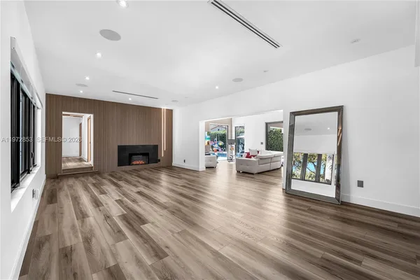 a view of a livingroom with wooden floor