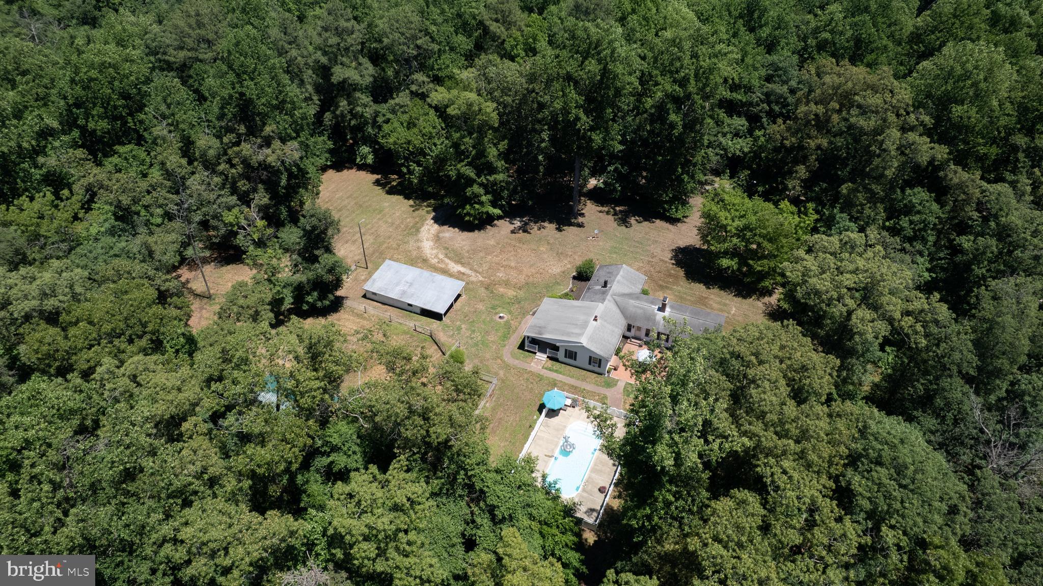 23130 Sparks Road Ridgely, MD 21660 - Photo 68 of 74 an aerial view of residential house with outdoor space and trees all around