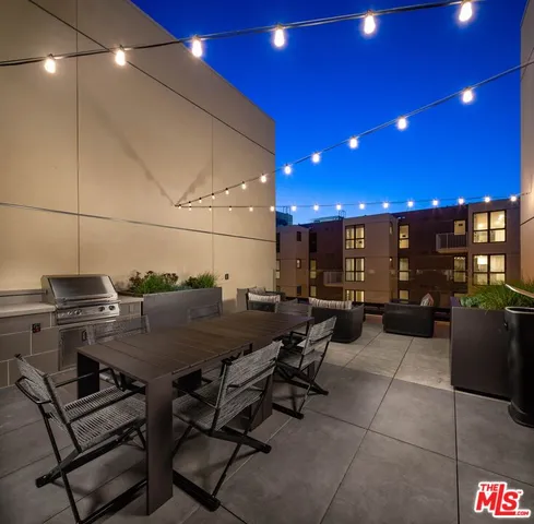 a outdoor space with lots of chairs and tables