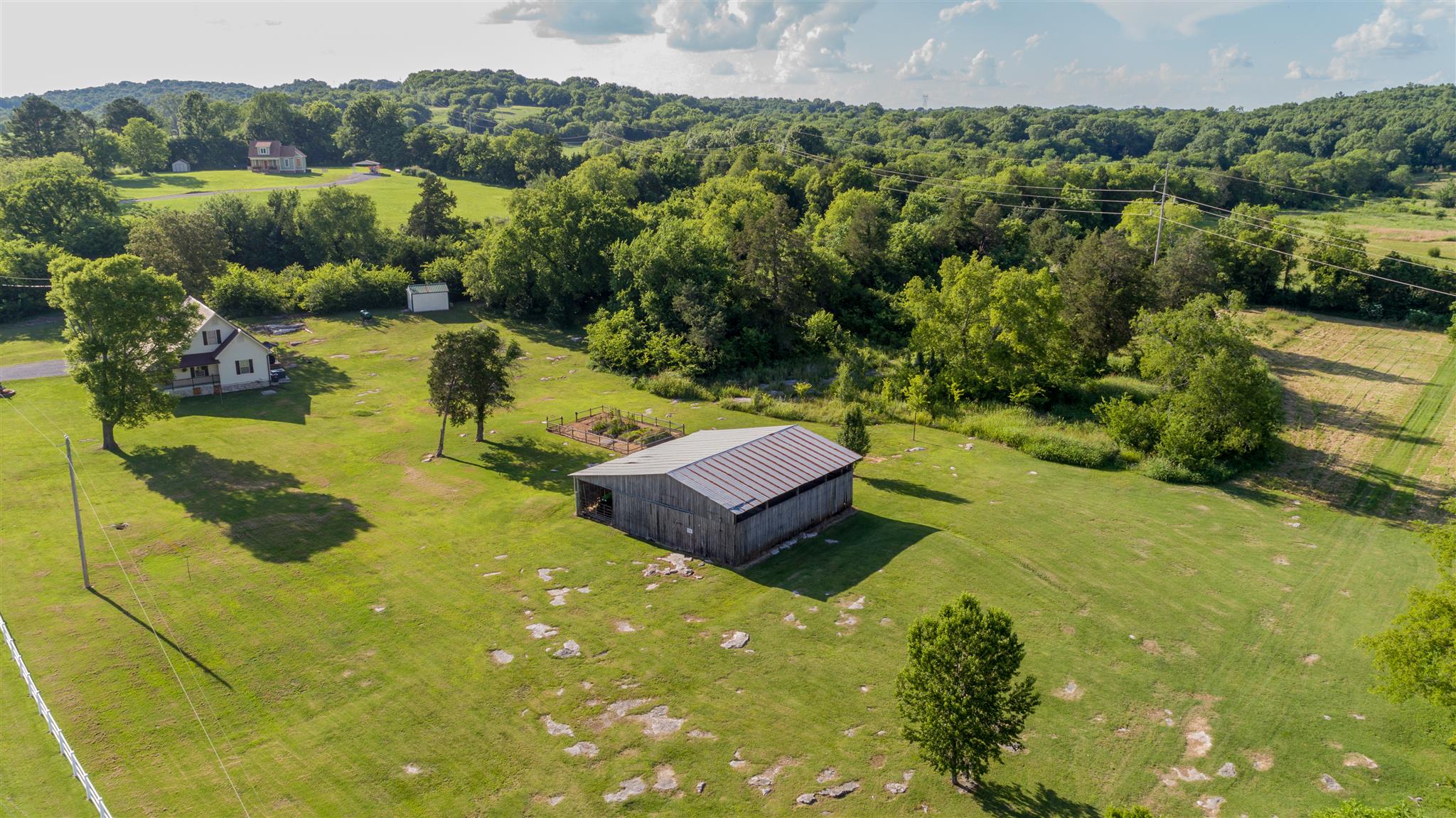 845 Roberts Road Watertown, TN 37184 - Photo 5 of 30 a view of a swimming pool with a yard