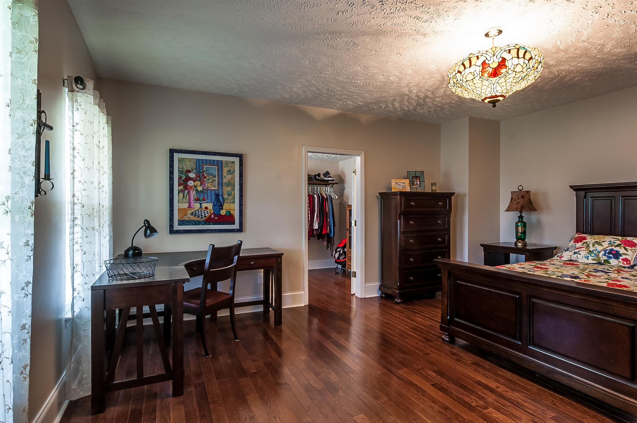 845 Roberts Road Watertown, TN 37184 - Photo 8 of 30 a living room with furniture and a flat screen tv