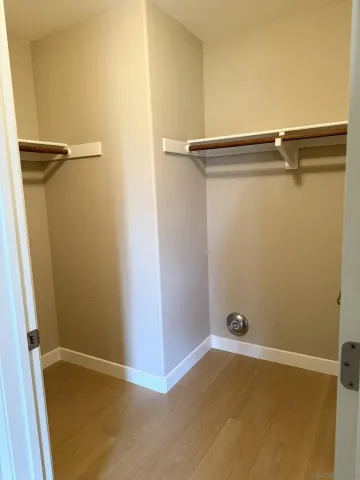 a bathroom with a sink a mirror and a shower