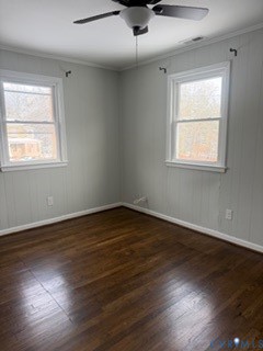 4611 Hickory Road Petersburg, VA 23803 - Photo 19 of 22 an empty room with wooden floor and windows