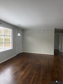 4611 Hickory Road Petersburg, VA 23803 - Photo 4 of 22 an empty room with wooden floor and windows