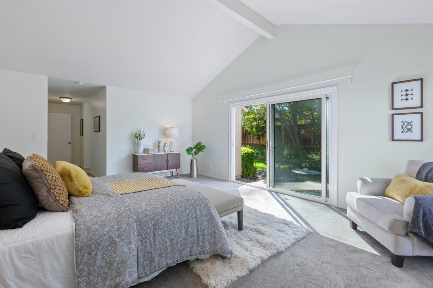 244 Delphi Circle Los Altos, CA 94022 - Photo 27 of 61 a bedroom with a bed and glass window