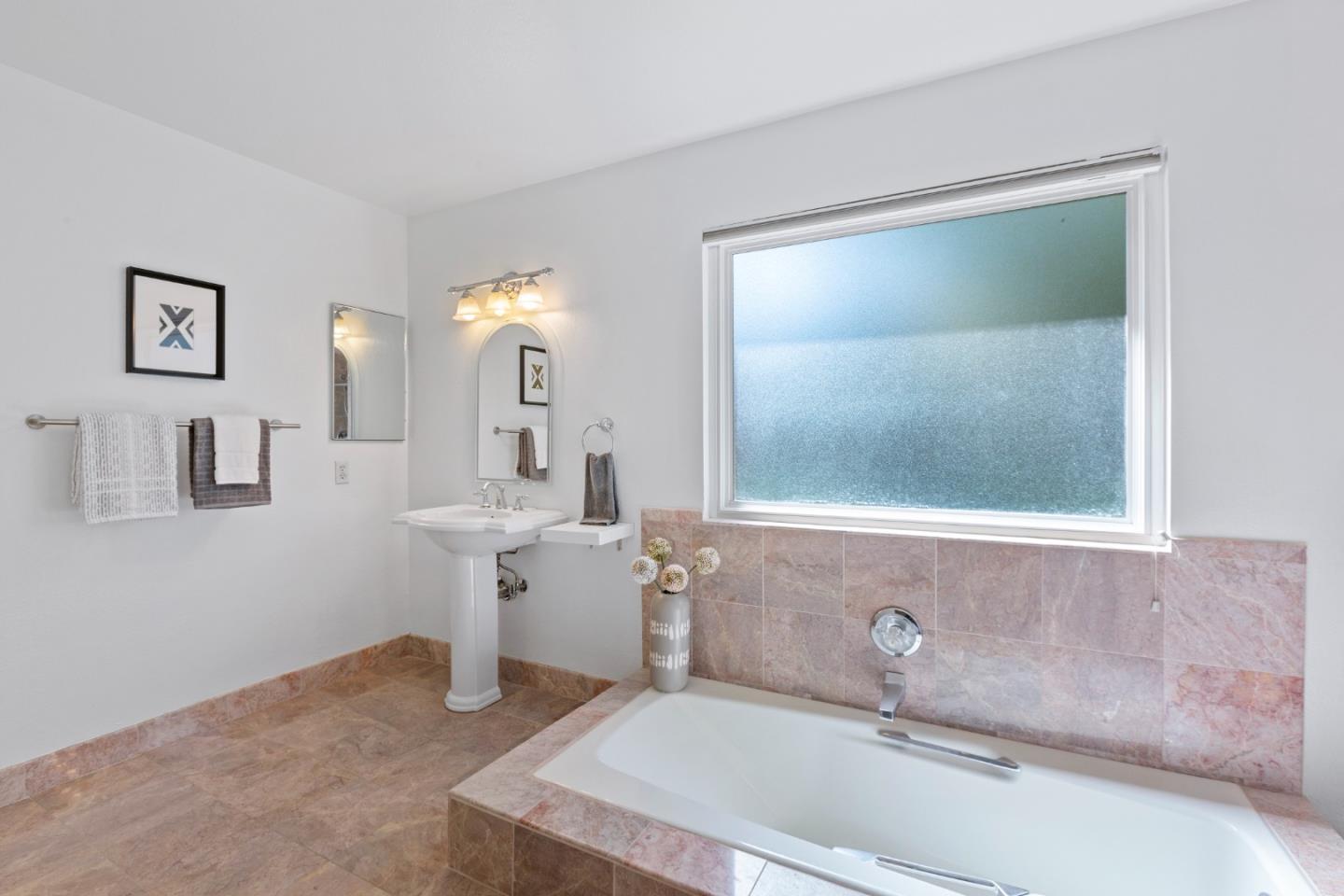 244 Delphi Circle Los Altos, CA 94022 - Photo 28 of 61 a bathroom with a sink and a mirror