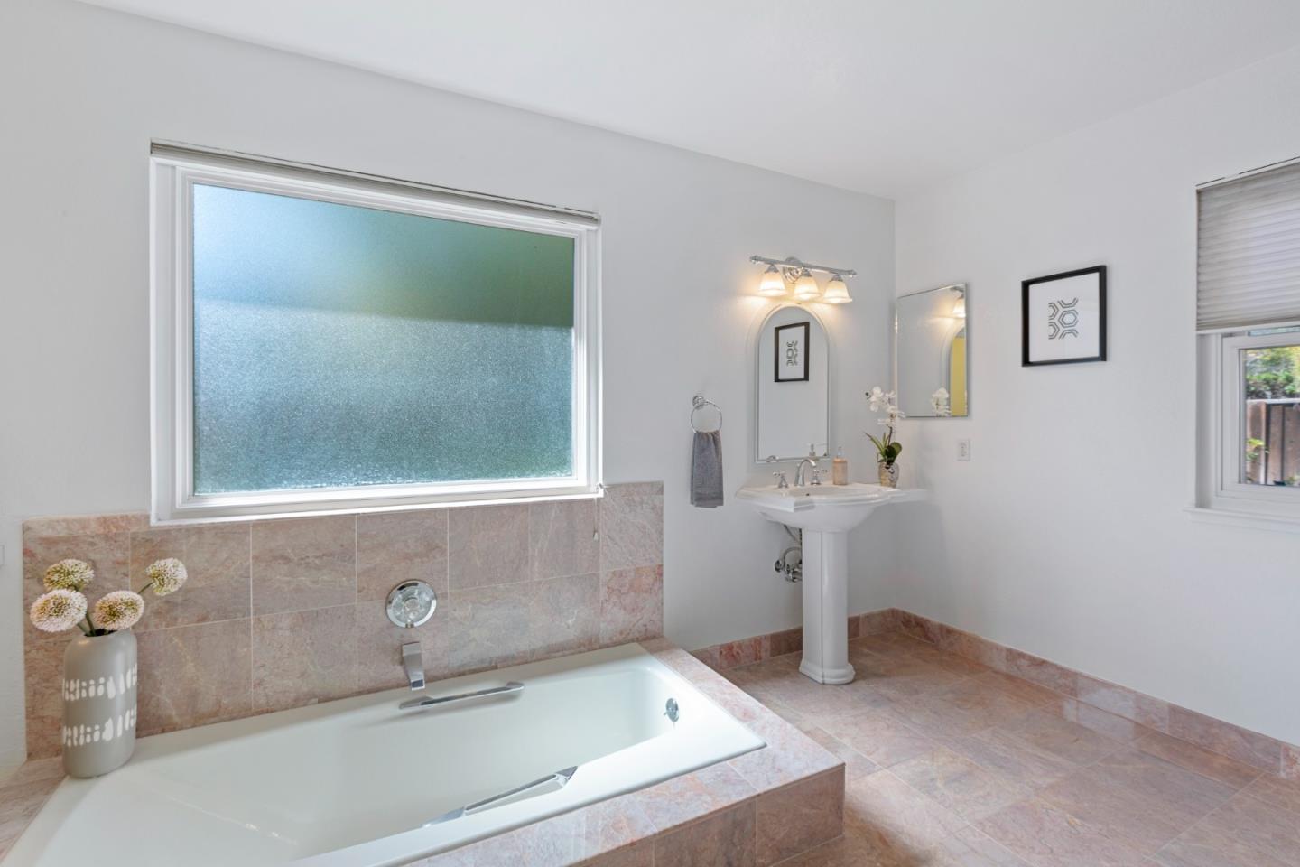 244 Delphi Circle Los Altos, CA 94022 - Photo 29 of 61 a bathroom with a sink and mirror