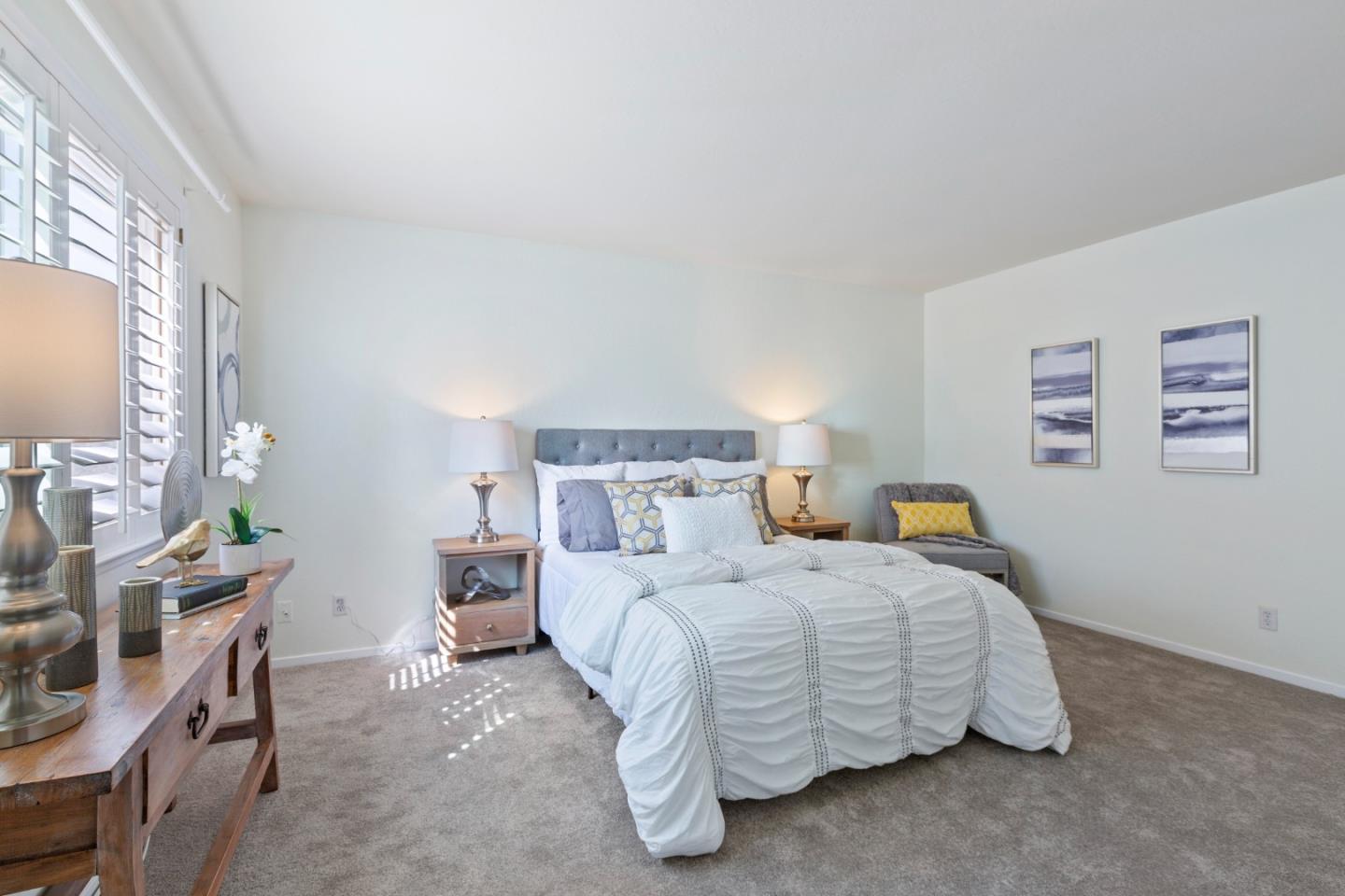 244 Delphi Circle Los Altos, CA 94022 - Photo 32 of 61 a bedroom with a bed and a window