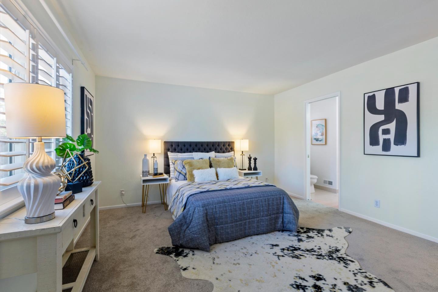 244 Delphi Circle Los Altos, CA 94022 - Photo 37 of 61 a bedroom with a bed potted plant on dresser and a window