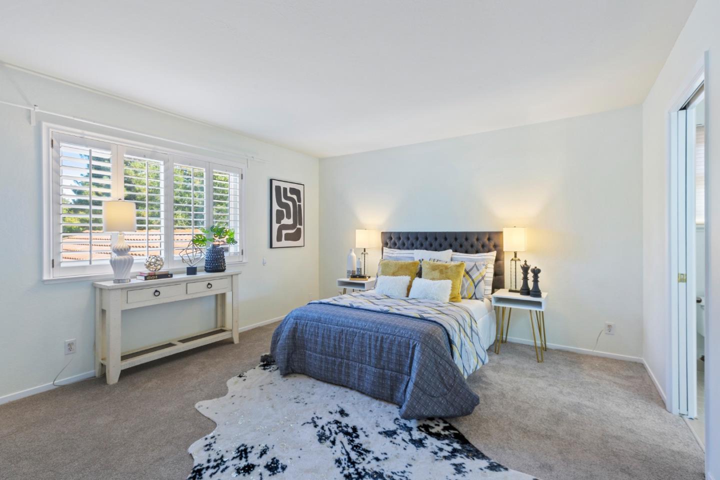 244 Delphi Circle Los Altos, CA 94022 - Photo 38 of 61 a bed room with a bed and a window