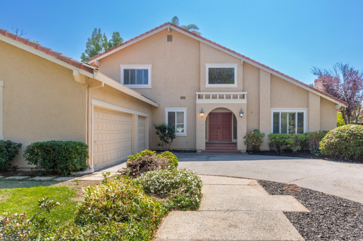 244 Delphi Circle Los Altos, CA 94022 - Photo 4 of 61 a front view of a house with garden