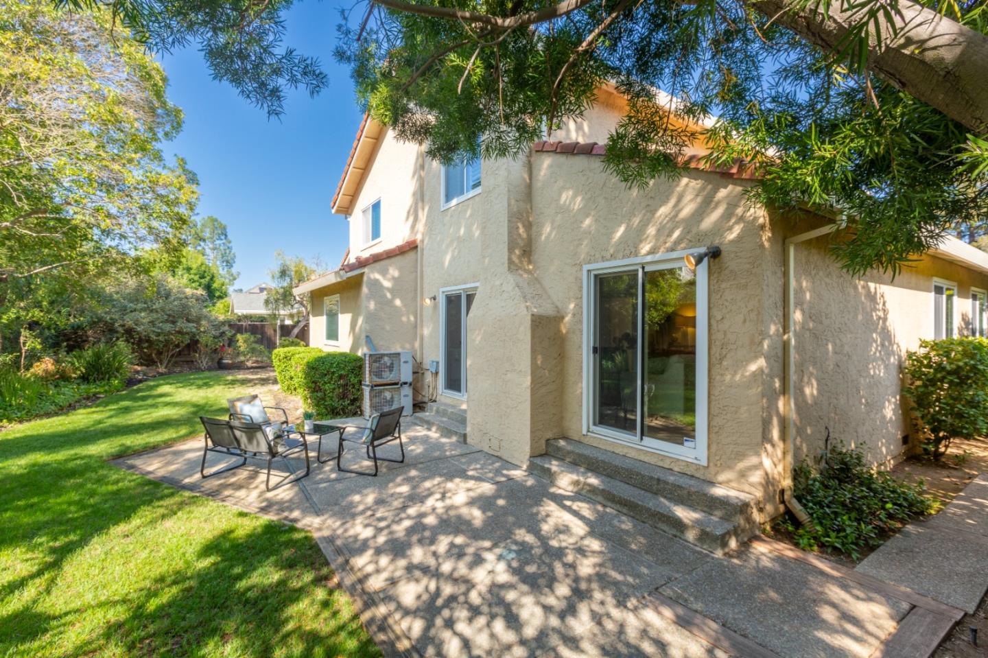 244 Delphi Circle Los Altos, CA 94022 - Photo 43 of 61 a view of a chair and table in backyard of the house