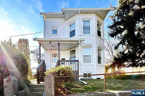 front view of house with a yard