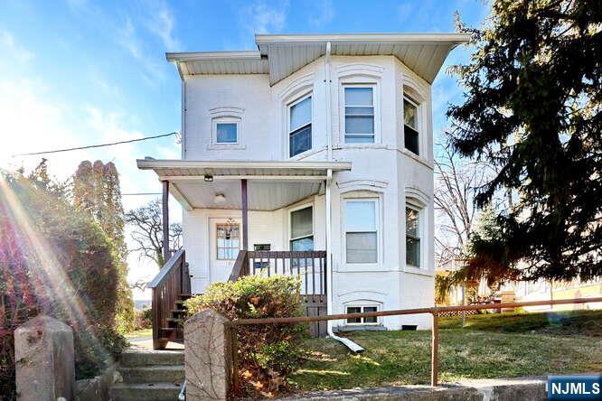 front view of house with a yard