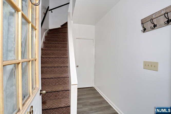 68 Mohawk Avenue, Unit 1 Hawthorne, NJ 07506 - Photo 3 of 21 a view of an entryway with staircase