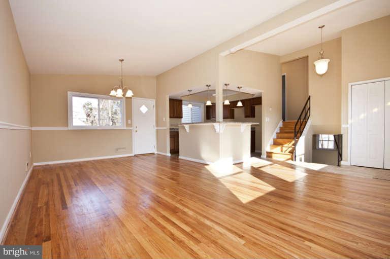 3502 Sedgemoor Road Baltimore, MD 21207 - Photo 5 of 29 a view of a kitchen with furniture and wooden floor