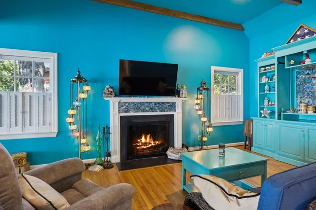 a living room with furniture and a table