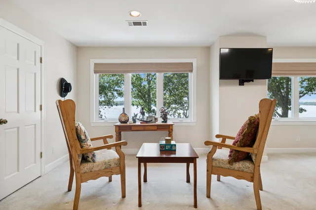 wooden view of a livingroom with a workspace