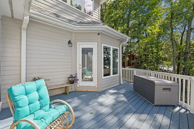 a view of a lake with a mountain and trees