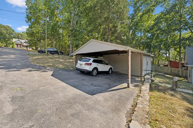 a backyard of a house with lots of green space