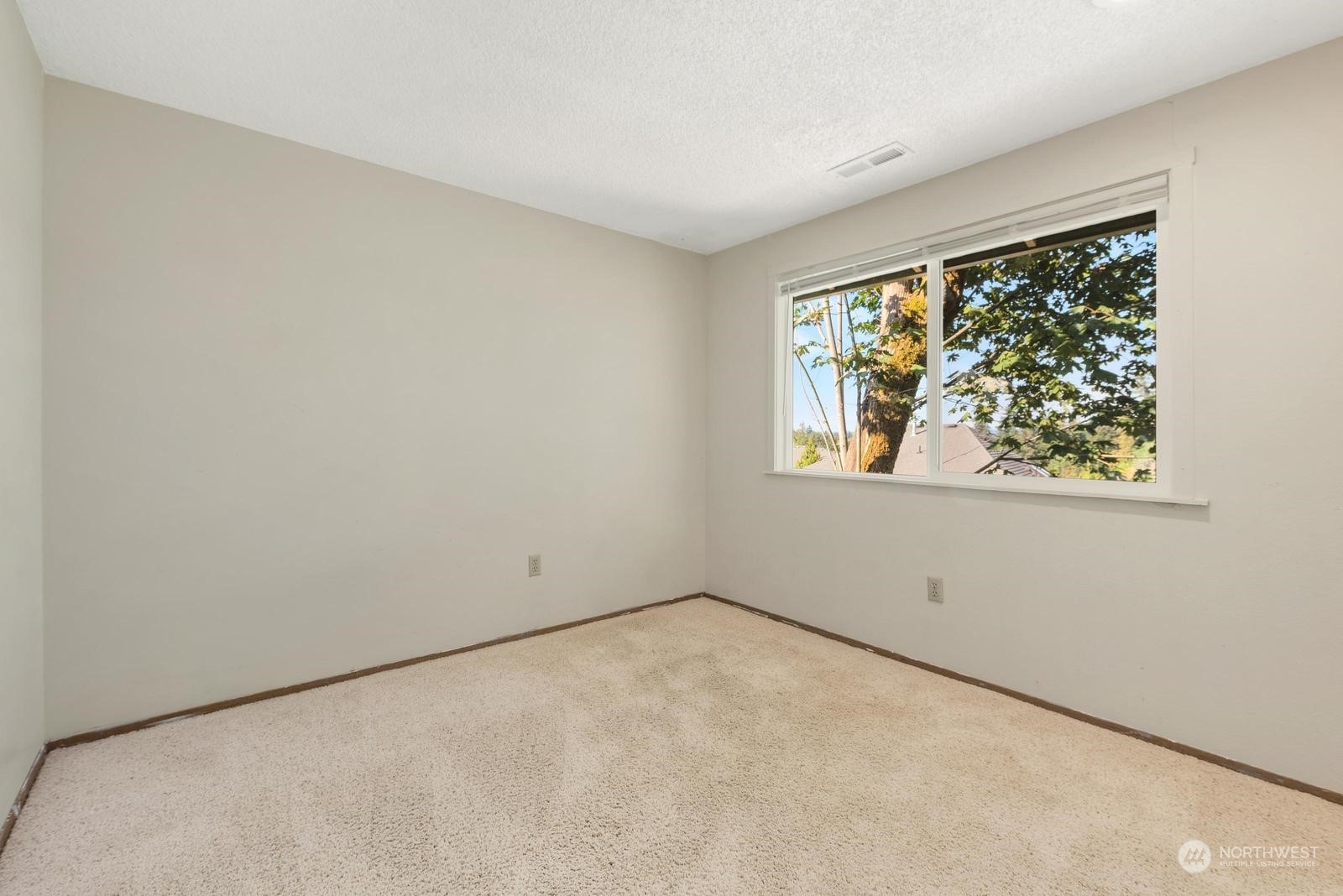 2102 240th Place Southeast Bothell, WA 98021 - Photo 14 of 20 an empty room with a window