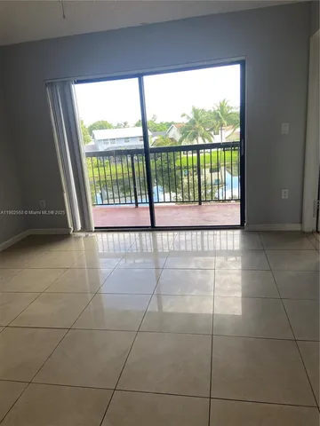 a view of a room that has a window