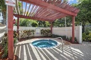 a view of a backyard with a patio