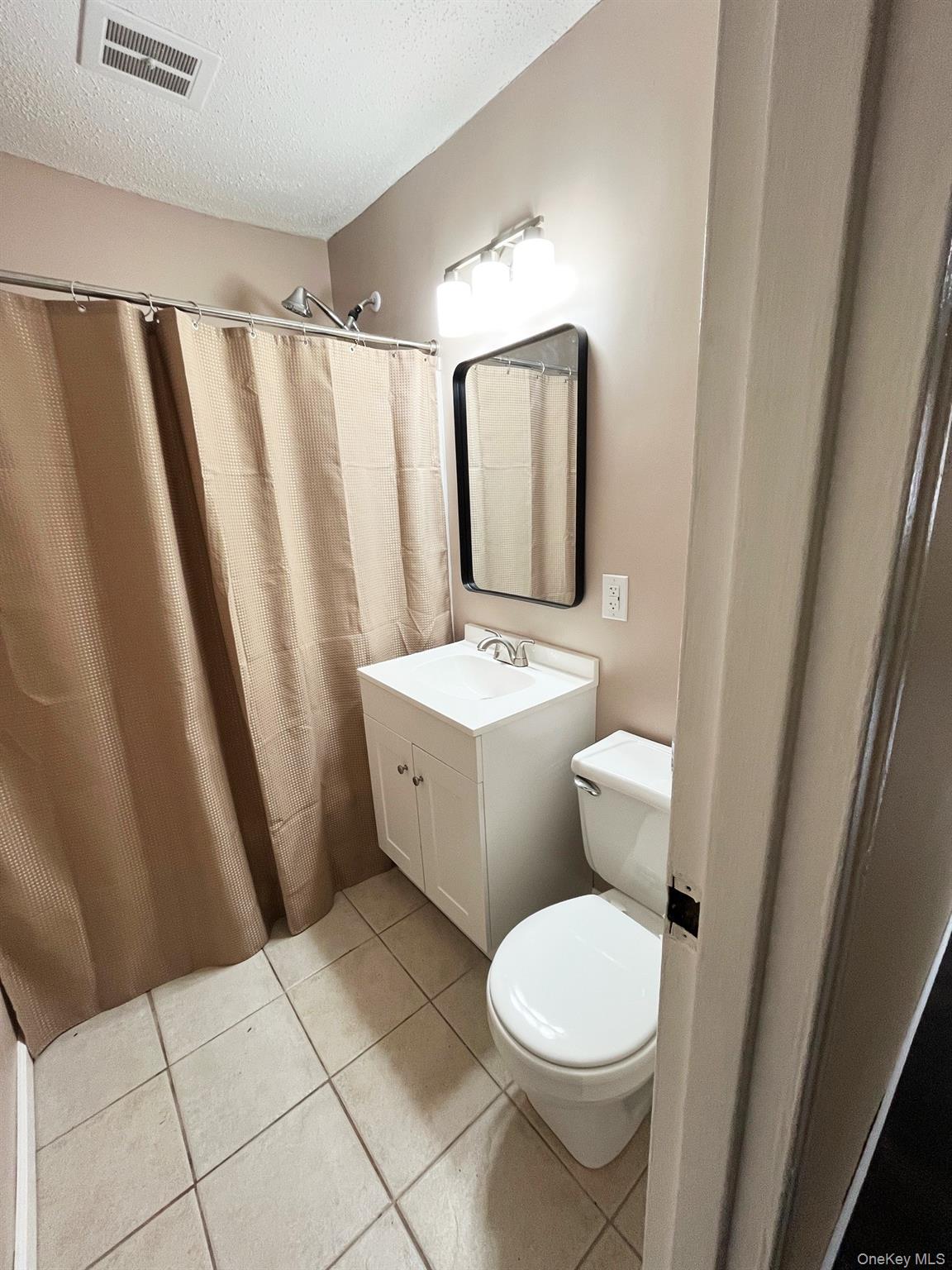 1403 Barclay Manor, Unit 14C Newburgh, NY 12550 - Photo 9 of 15 Pristine tile flooring in the bathroom.