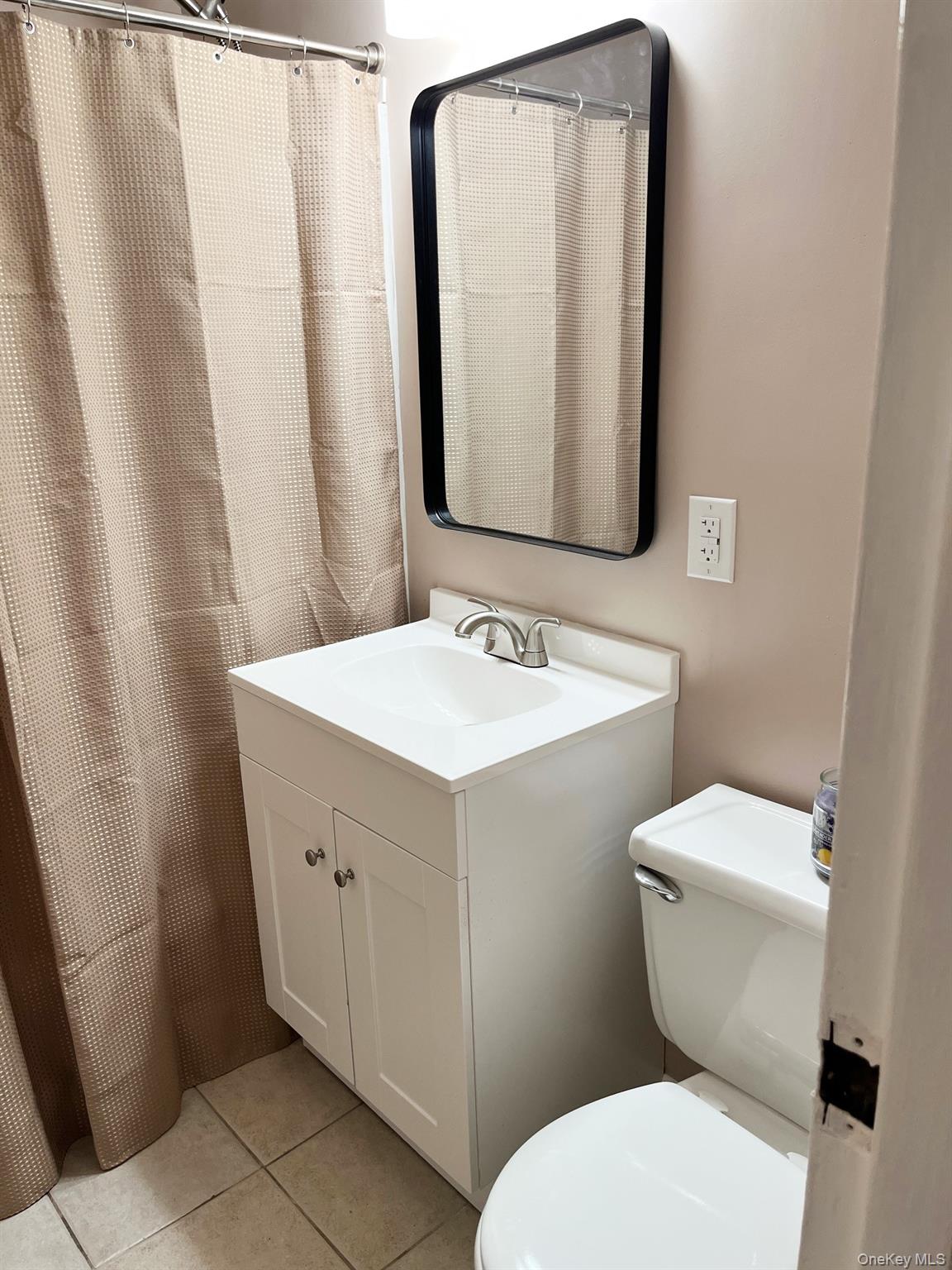 1403 Barclay Manor, Unit 14C Newburgh, NY 12550 - Photo 10 of 15 The bathroom has newer fixtures and it sparkles!