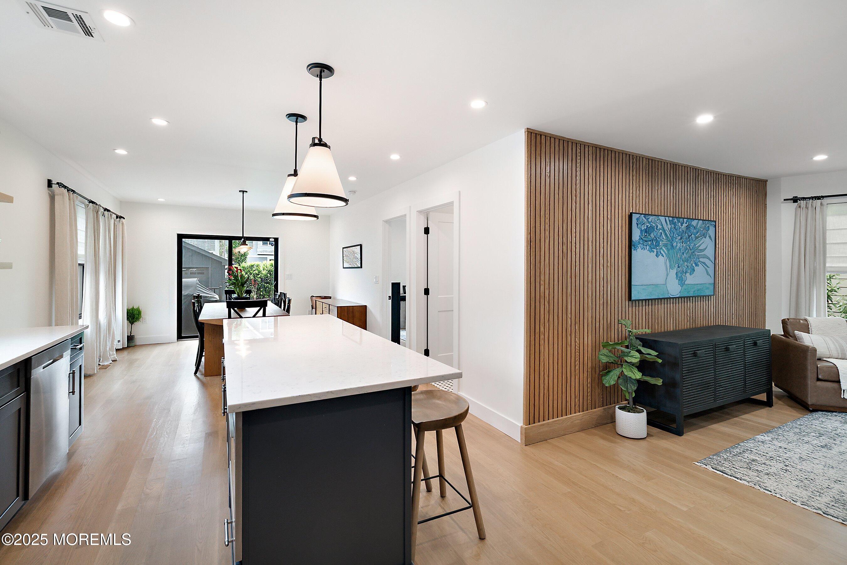 405 Ludlow Avenue Spring Lake, NJ 07762 - Photo 13 of 42 a large kitchen with sink a counter top space and stainless steel appliances