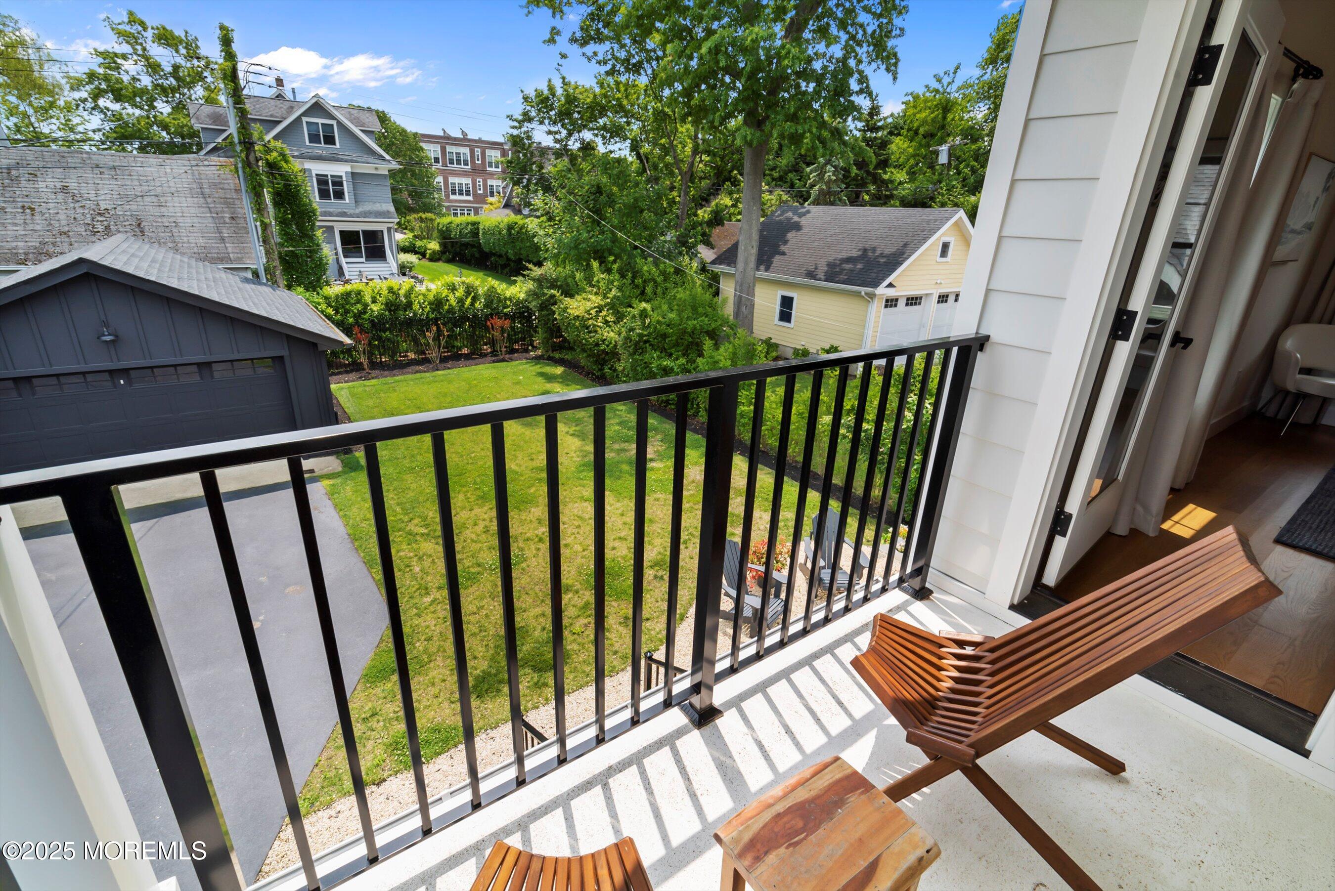 405 Ludlow Avenue Spring Lake, NJ 07762 - Photo 25 of 42 a view of balcony with furniture