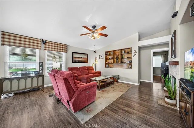 a bedroom with a bed and a book shelf