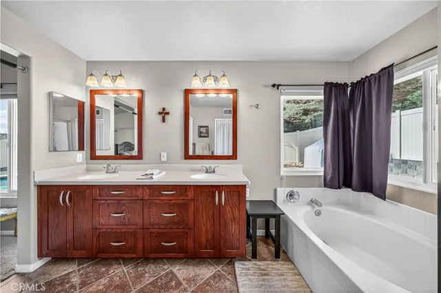 a swimming pool with outdoor seating yard barbeque oven and outdoor seating