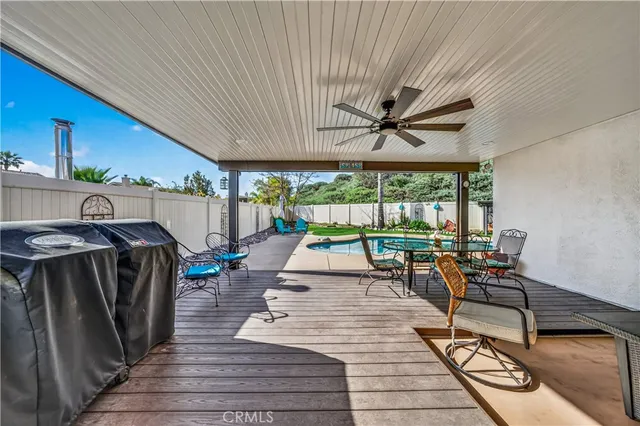 a view of a swimming pool with a sitting space