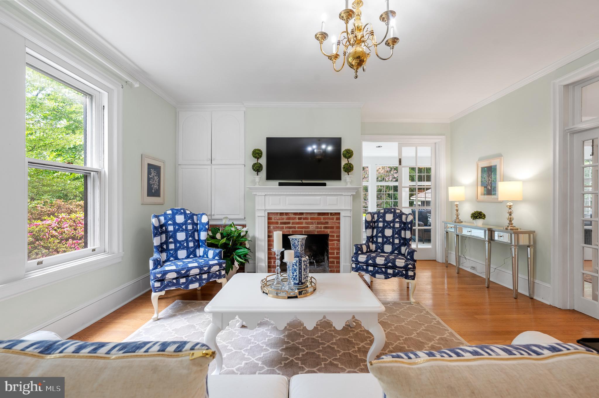 823 King Of Prussia Road Radnor, PA 19087 - Photo 16 of 71 a living room with furniture a flat screen tv and a fireplace