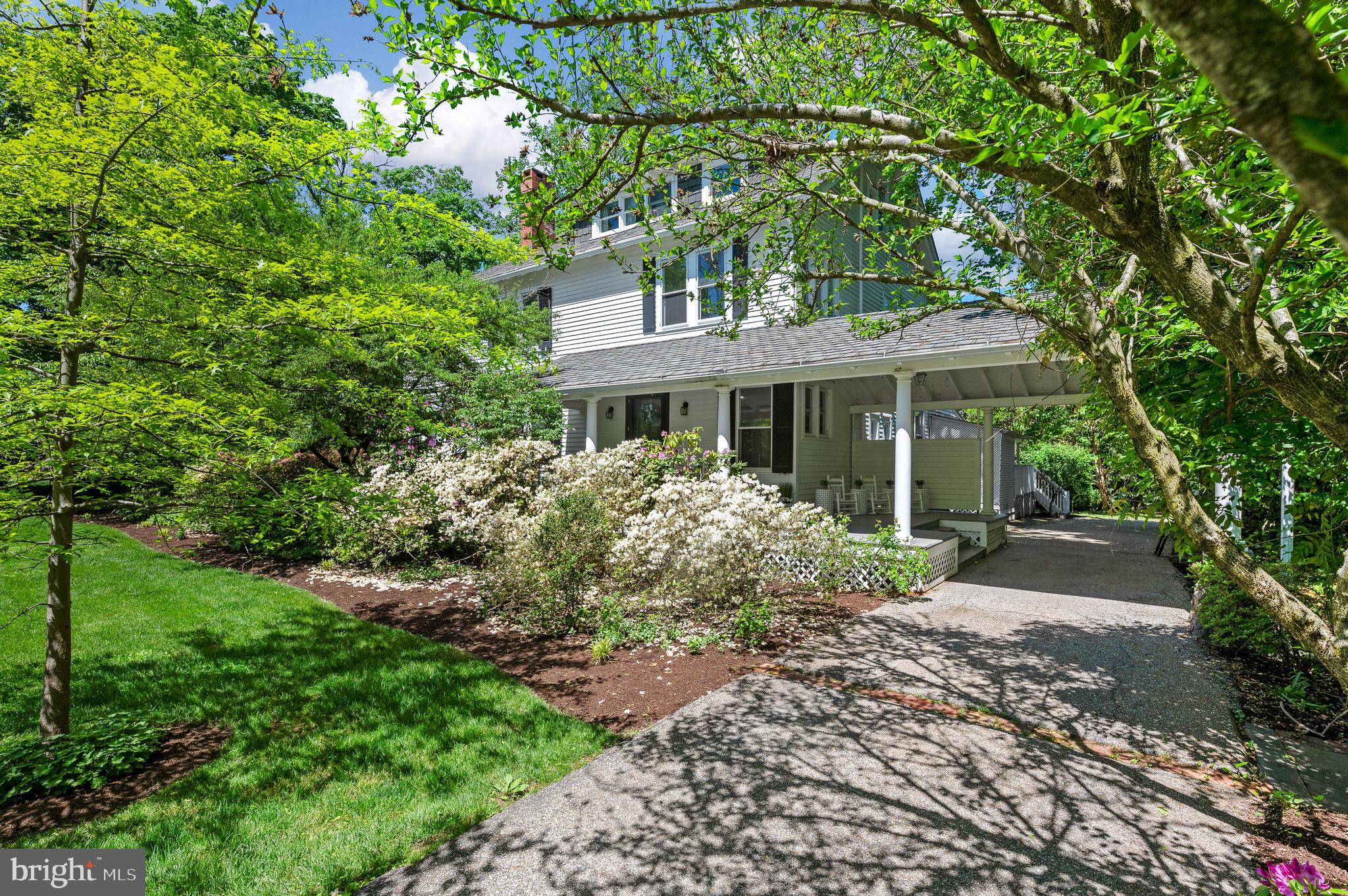 823 King Of Prussia Road Radnor, PA 19087 - Photo 2 of 71 a front view of a house with a garden