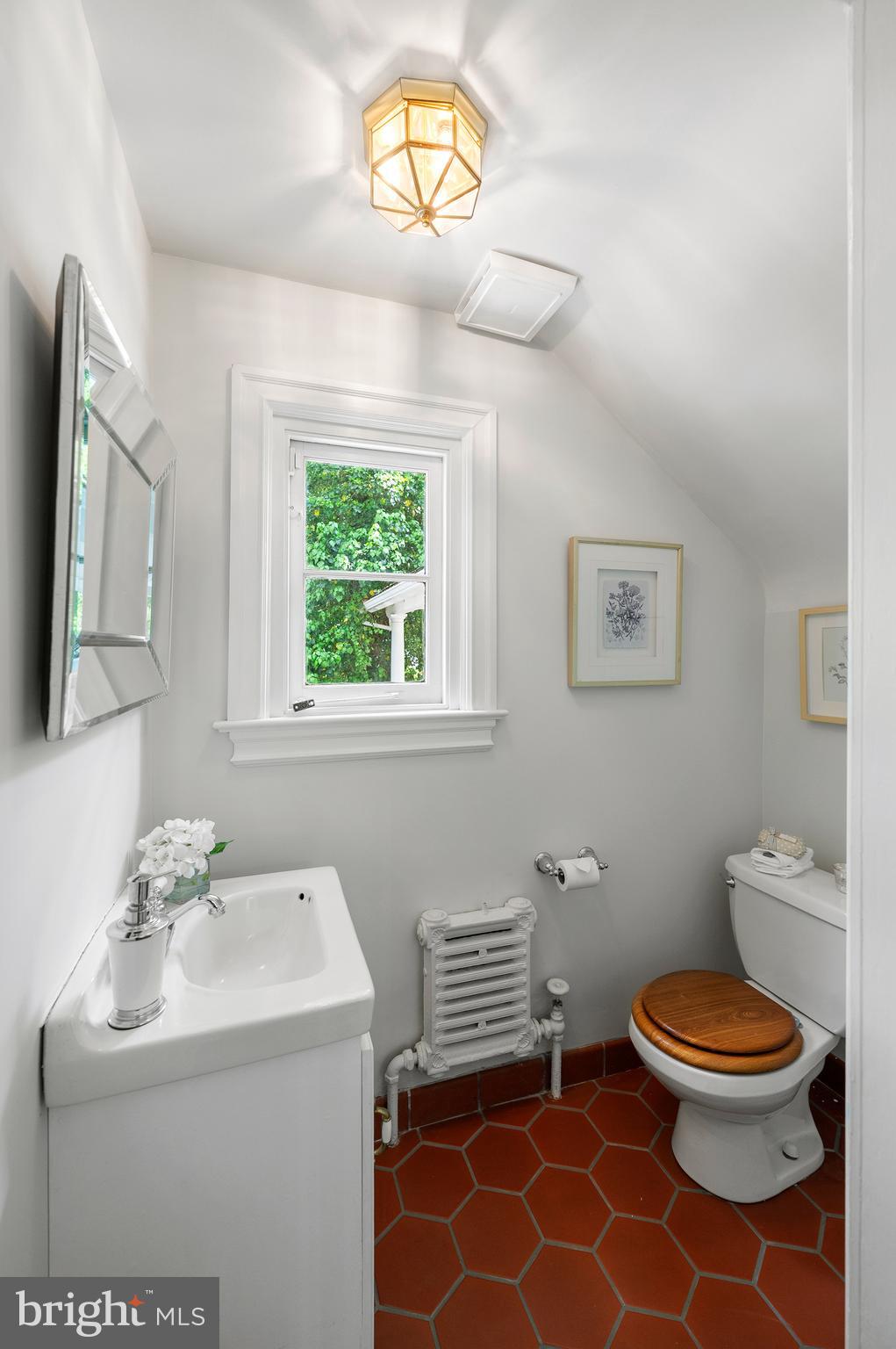 823 King Of Prussia Road Radnor, PA 19087 - Photo 35 of 71 a bathroom with a toilet a sink and mirror